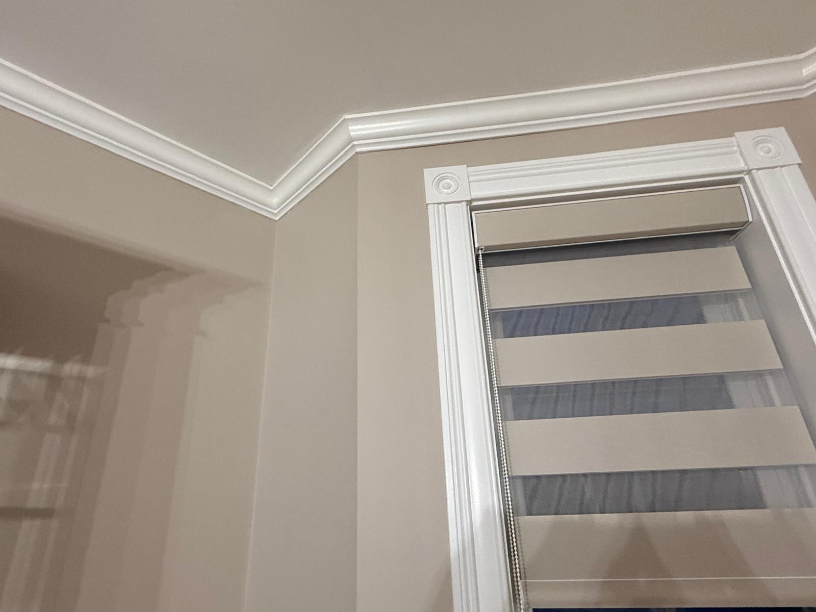 Crown molding and window casing finish carpentry by Betel Carpentry Inc